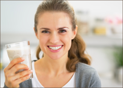 Woman holding a shake